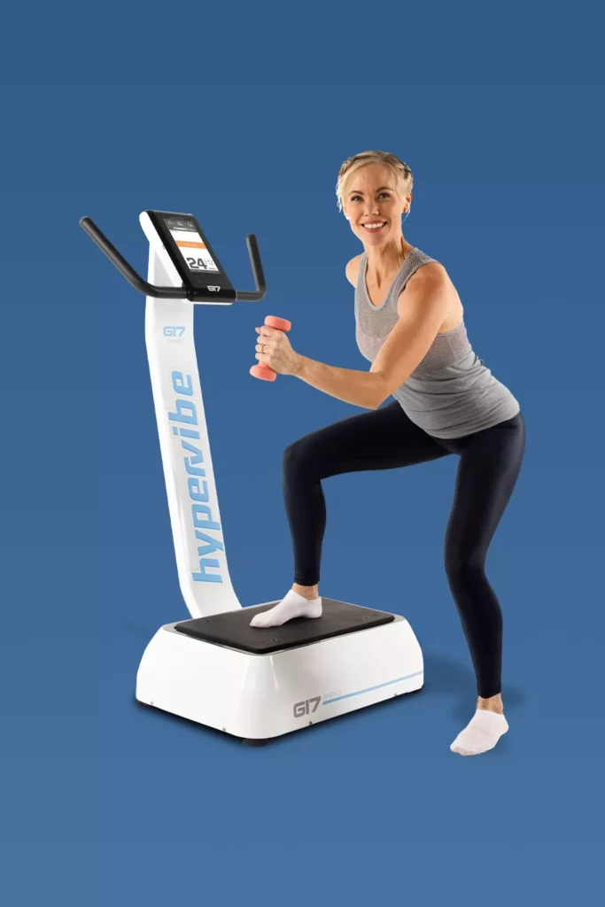 Fit woman performing lateral step-up on aerobic step platform