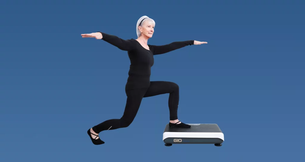 Older woman performing a front lunge on a hypervibe vibration platform