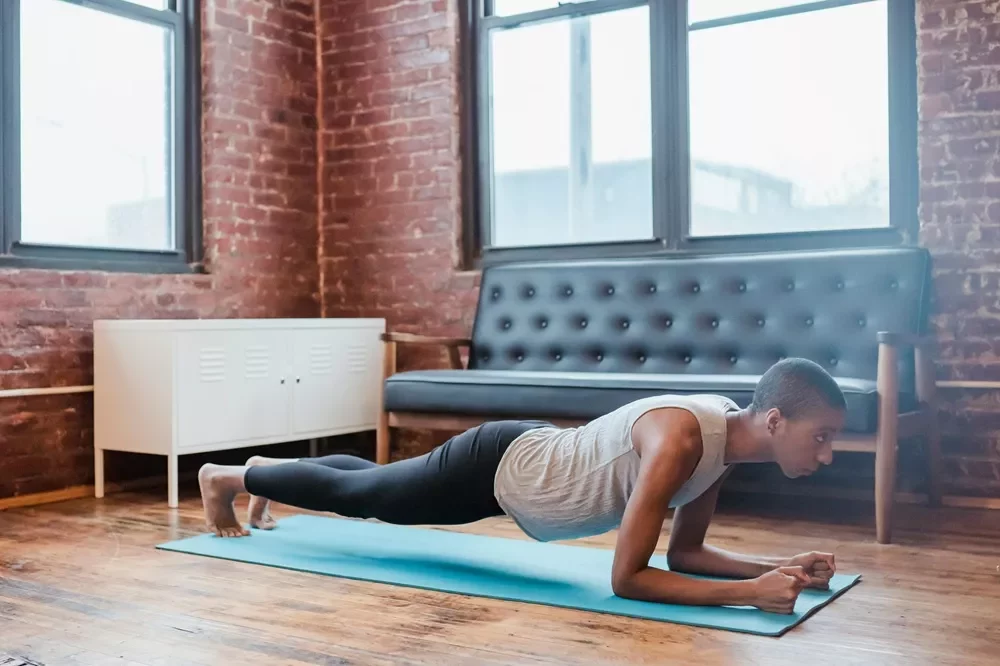 doing a planks on a yoga mat