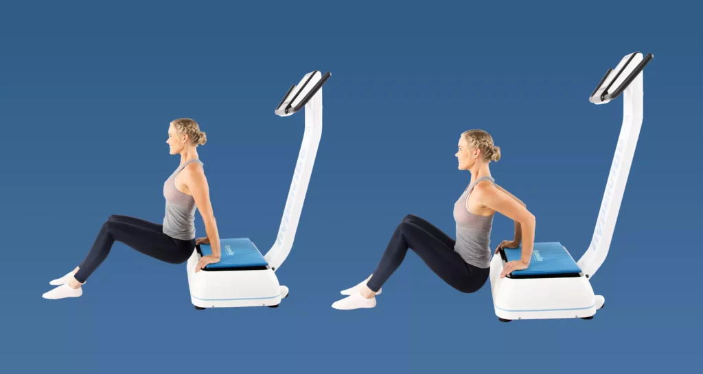 woman performing tricep dips on a hypervibe vibration platform