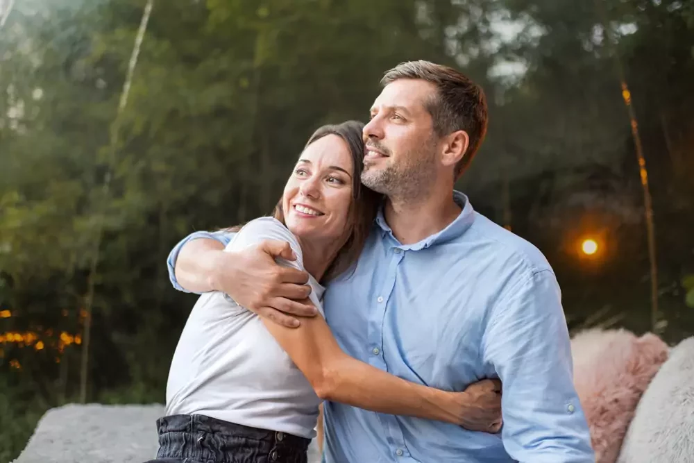 Man happily hugging his wife